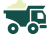 Camion-benne vert transportant du sable.