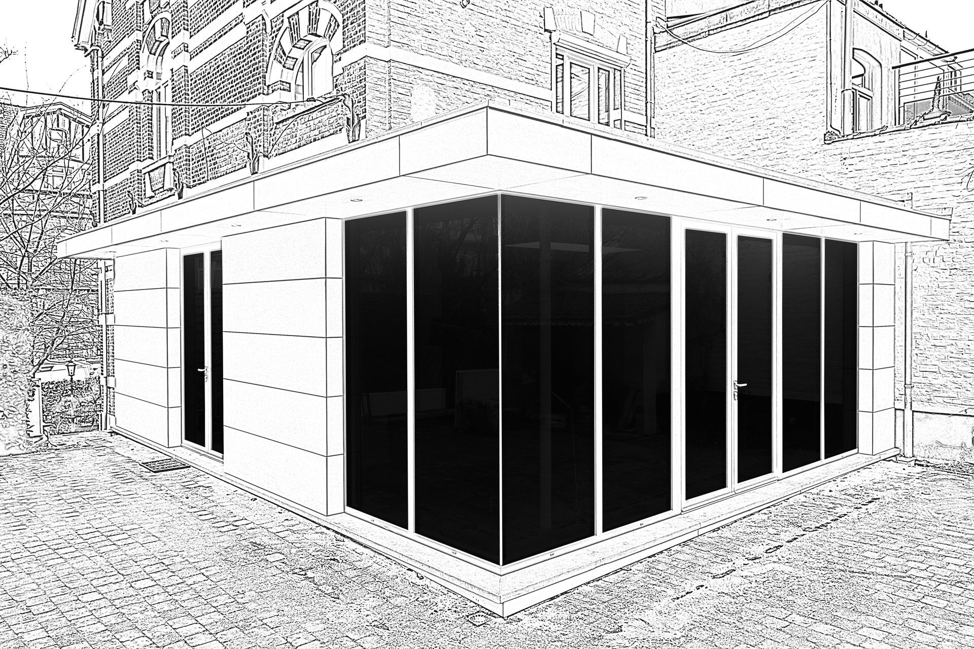 Immeuble d'angle moderne à façade vitrée, avec panneaux sombres et façade blanche, situé à un carrefour de rue.