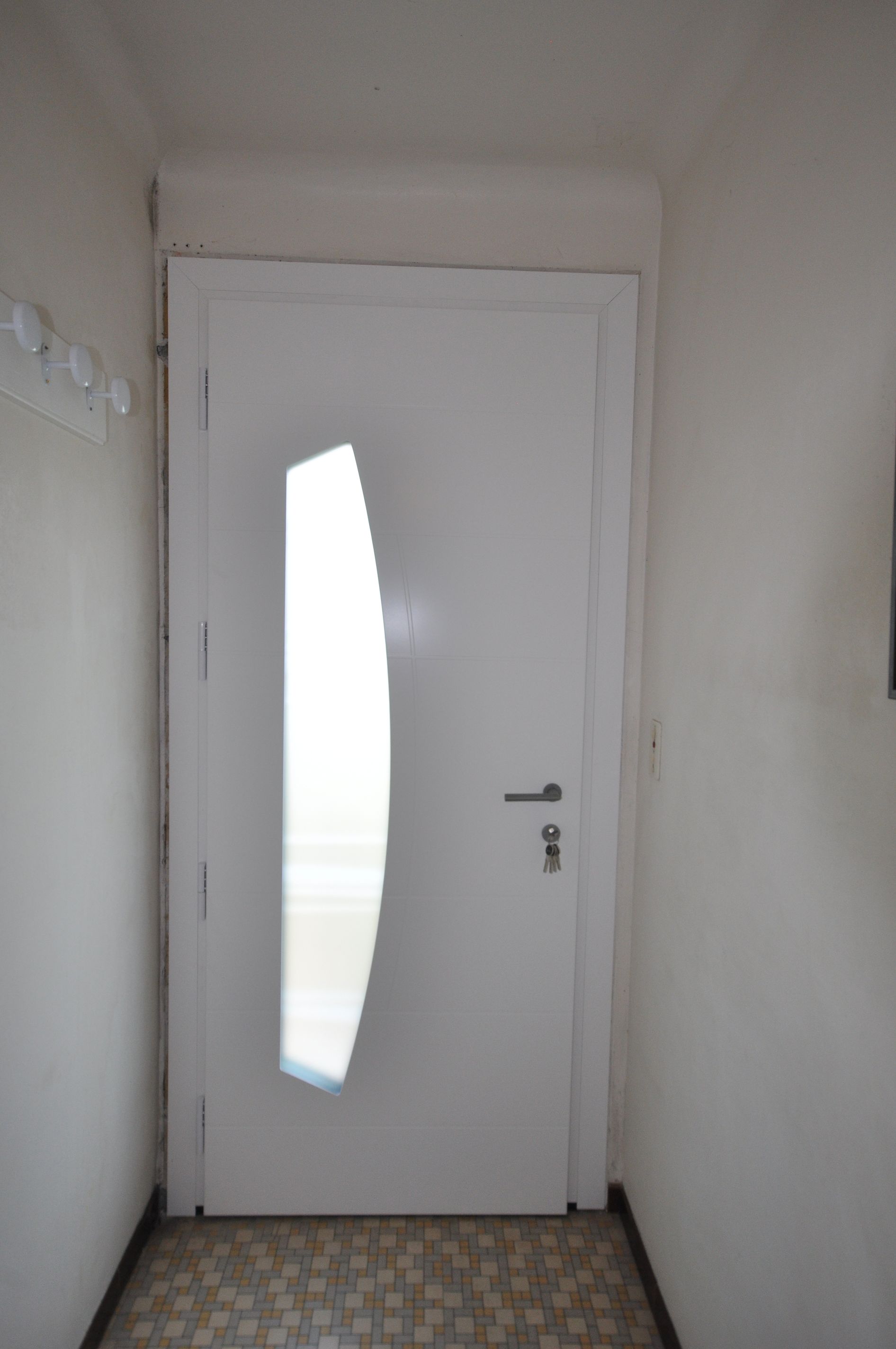 Porte en alu blanc avec vitre