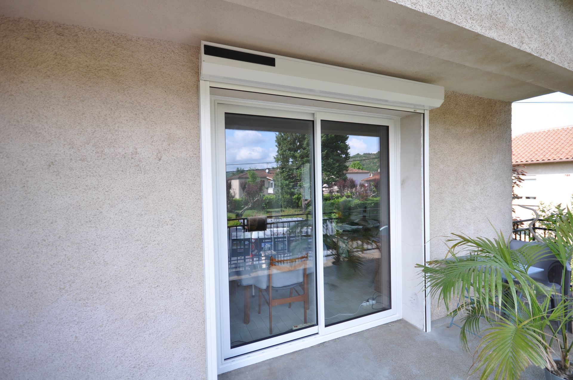 Volet roulant sur une baie vitrée