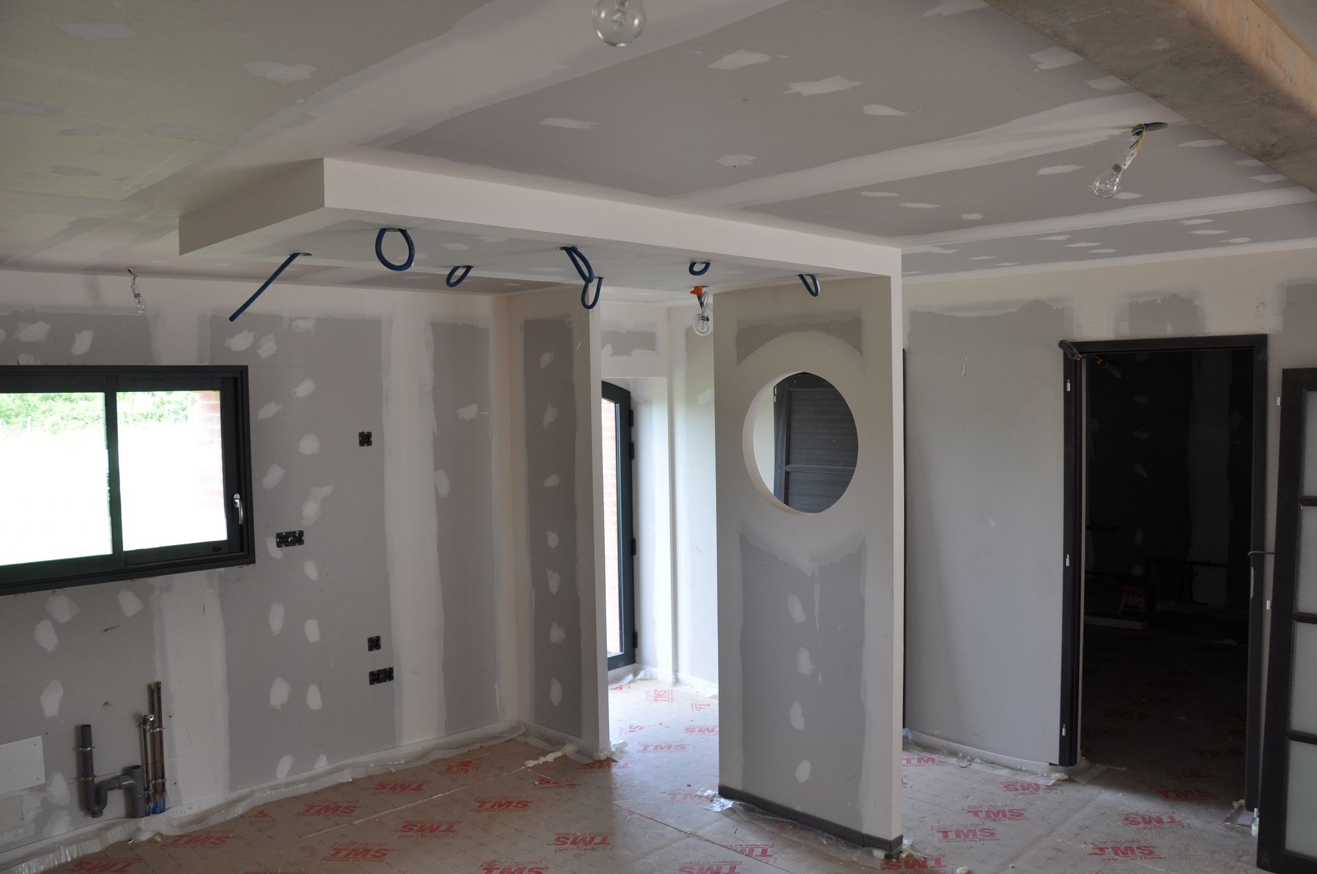 Création d'un module en plaques de plâtre dans une habitation en rénovation