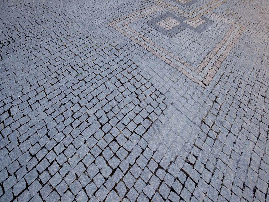 Gros plans de dalles sur un sol extérieur - dallage