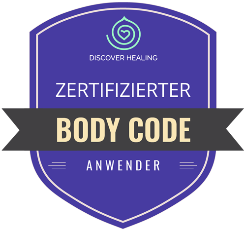 Ein lila Schild mit den Worten „Zertifikater Body Code Anwender“ darauf