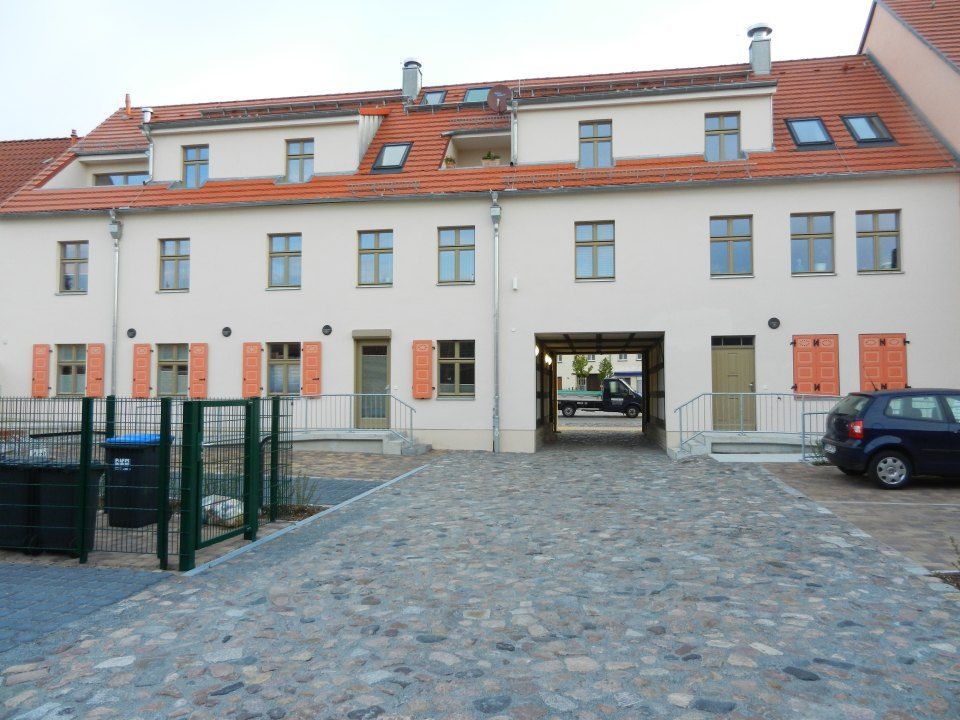 kompletter Abriß und Neubau eines Gebäudekomplexes mit 5 Wohneinheiten und einer Arztpraxis am Markt in Liebenwalde