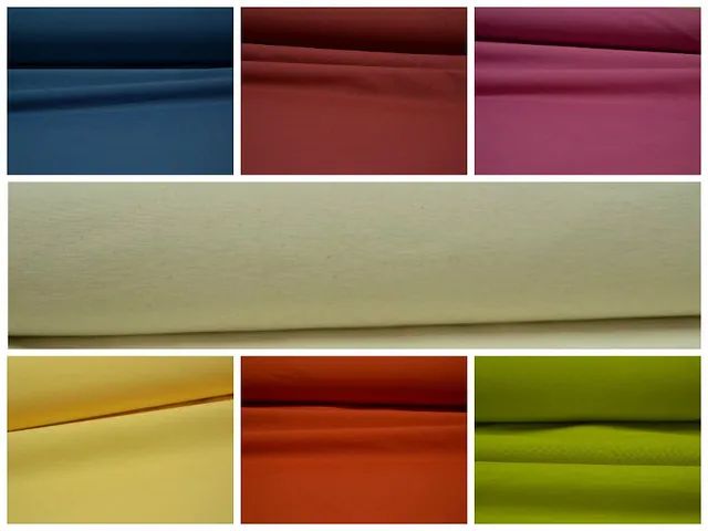 Un collage de telas de distintos colores.