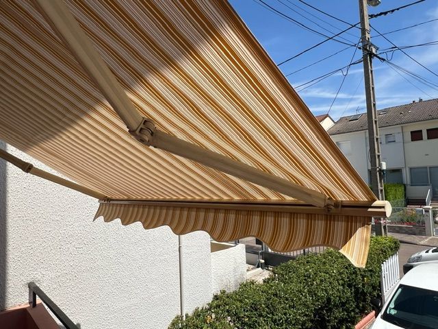 réentoilage d'un ancien store