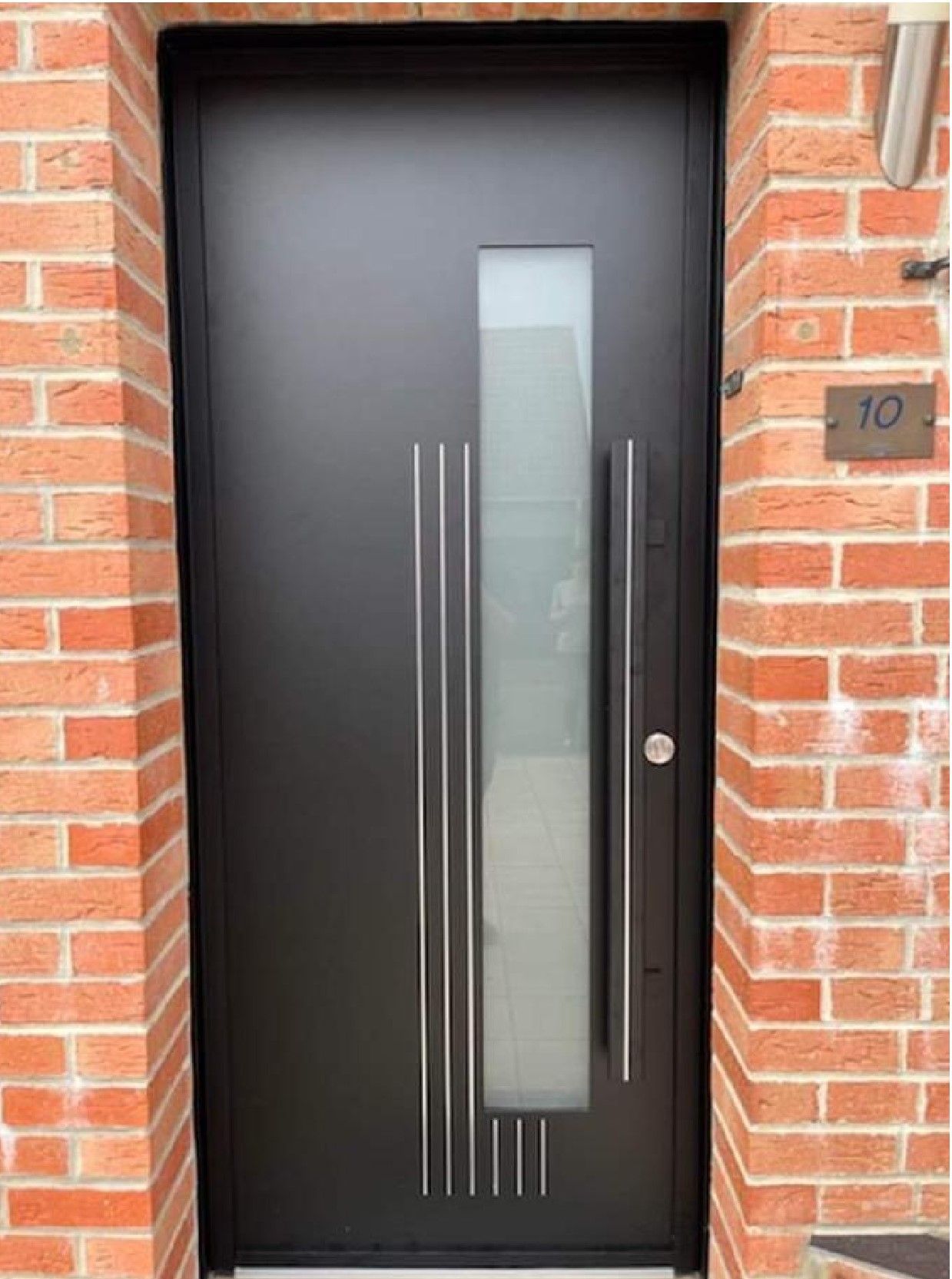 Porte entrée noire, grande poignée