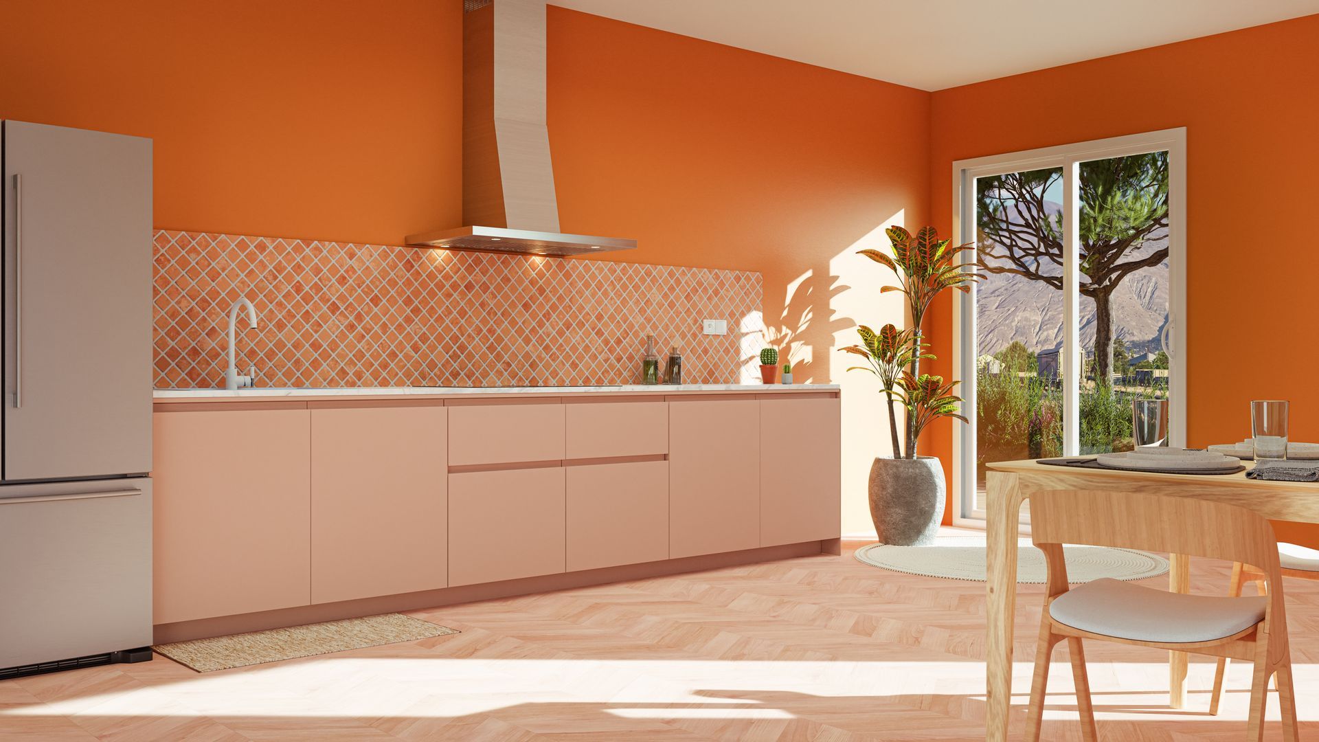 Cuisine moderne et lumineuse avec murs orange, placards clairs, table à manger et porte ouverte sur une terrasse ensoleillée