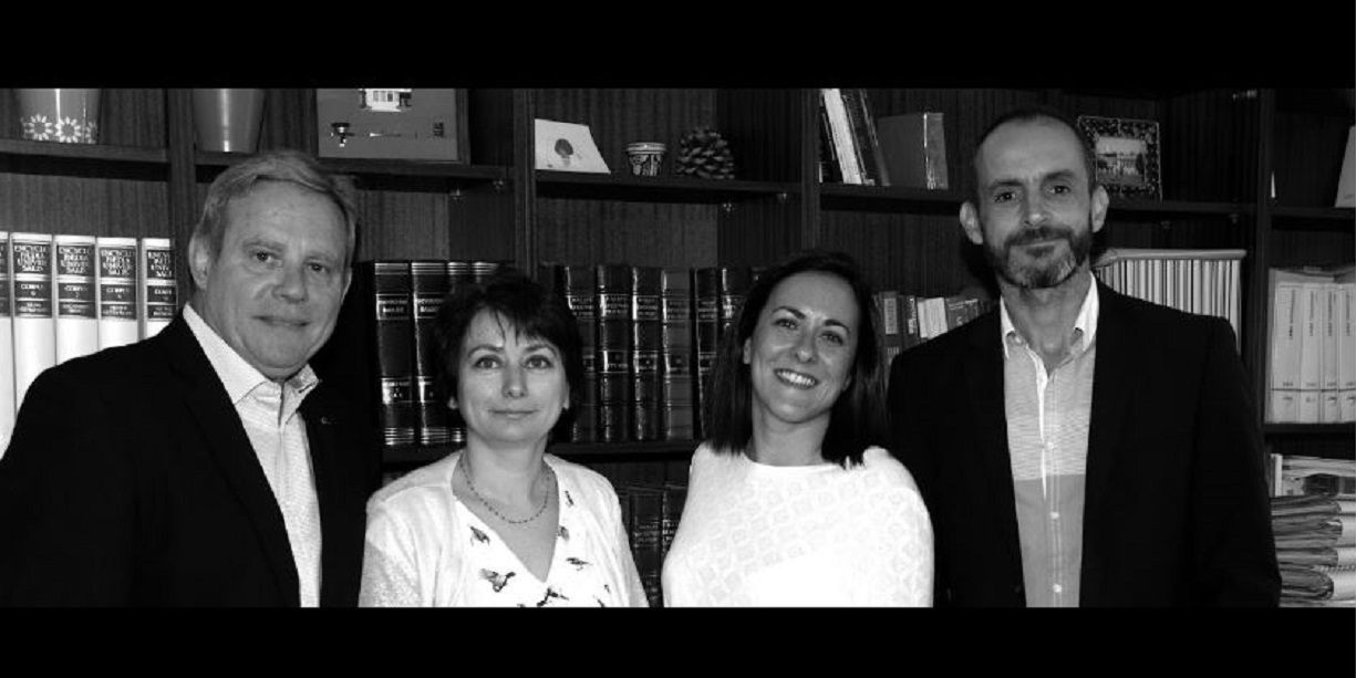 Photo des quatre avocats associés du cabinet Chatel & Associés