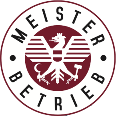 Meister BärtrieB-Logo mit kastanienbraunem Adleremblem und kreisförmigem schwarzem Text auf weißem Hintergrund
