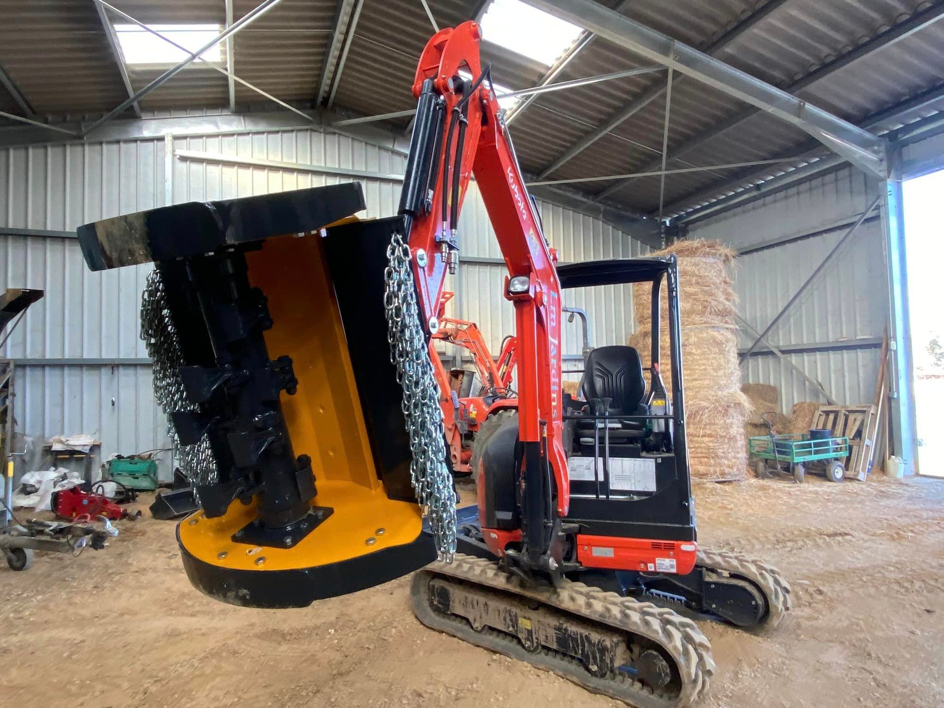 Bras débroussailleuse