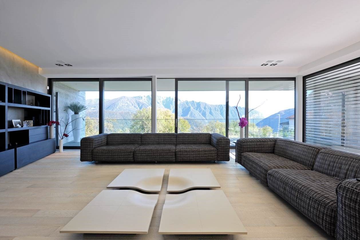 Villa in Carona, living room with sofas – Sangiorgio