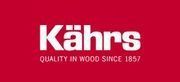 Logotipo de Kährs sobre fondo rojo con el eslogan “Calidad en madera desde 1857”.