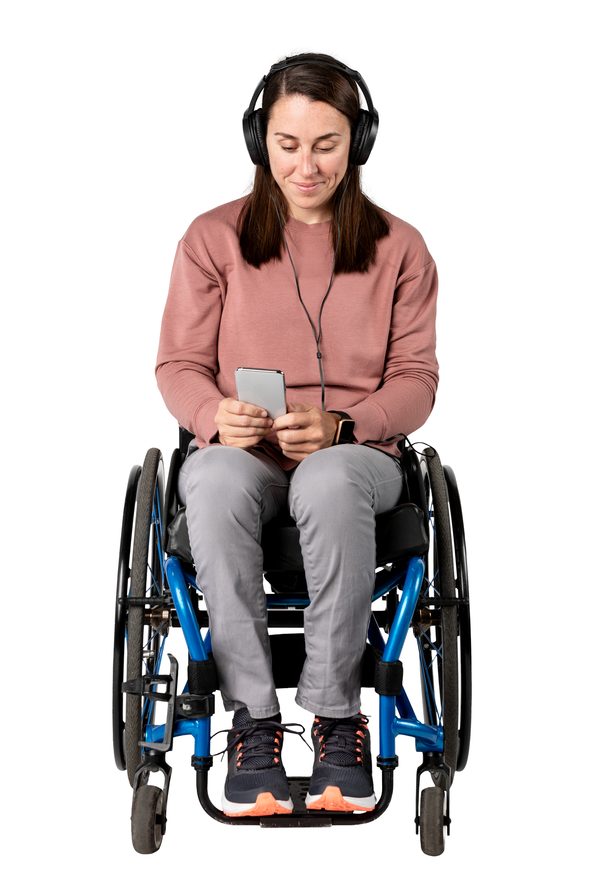 Une femme dans un fauteuil roulant au téléphone