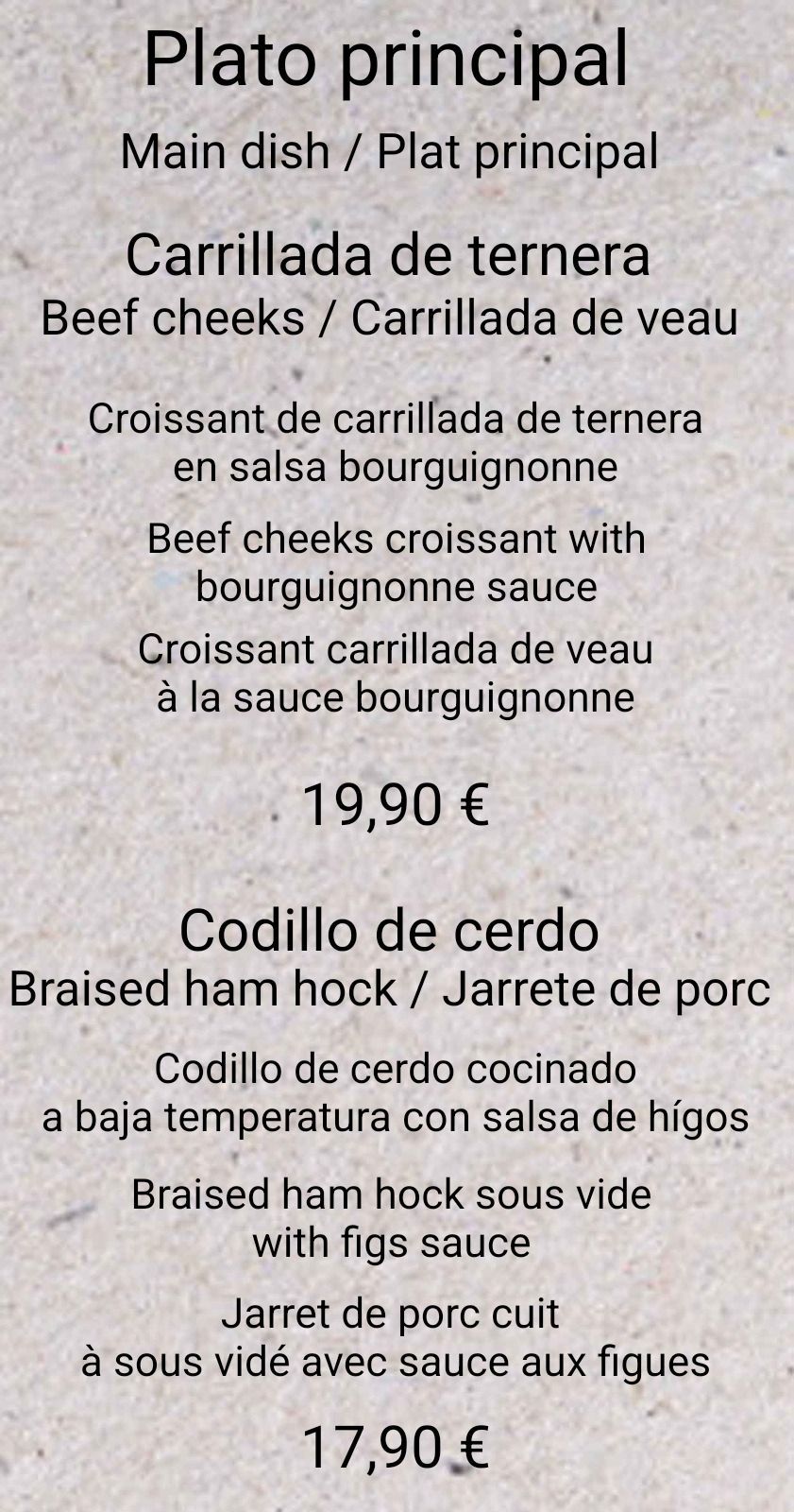 Un menú para el plato principal incluye un croissant de carrilleras de ternera con salsa borgoñona.