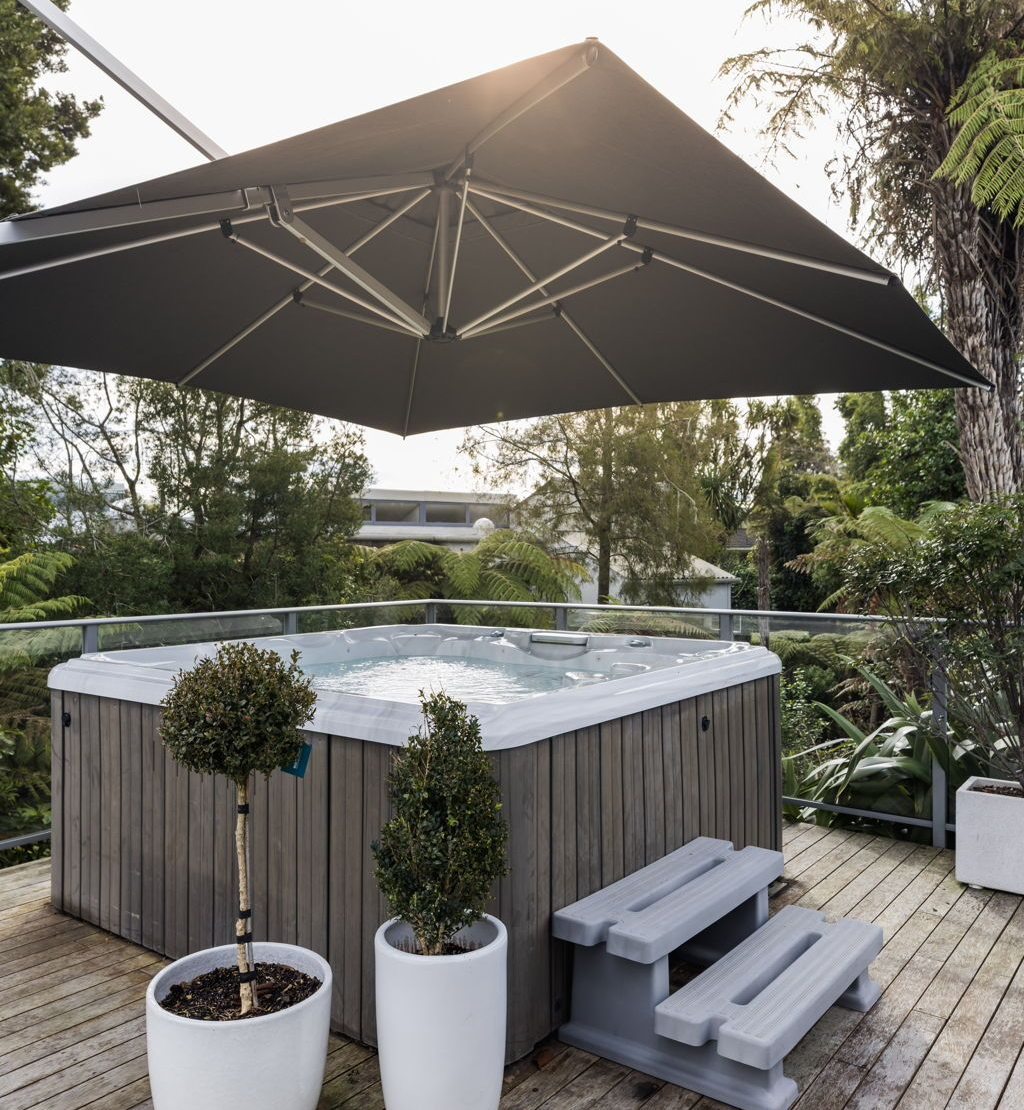 A living room with a table and chairs and a couch