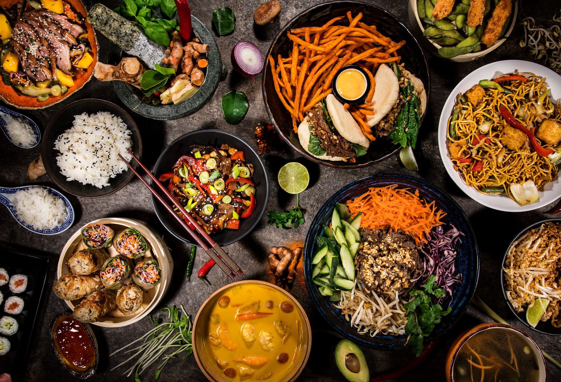 Colorful spread of Asian-inspired cuisine