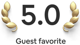 5.0 guest favorite badge with gold laurel icons on both sides