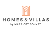 Homes & Villas by Marriott Bonvoy logo with orange geometric icon and gray text on white background