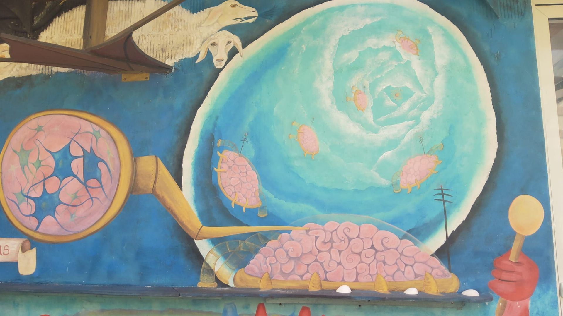 Una pintura de un globo terráqueo con una mano sosteniendo una cuchara.