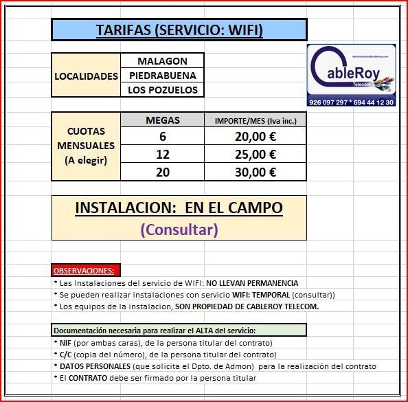 Tarifas de wifi en cartel con precios, localidades y aviso de instalación en el campo.