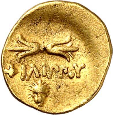 Eine Goldmünze mit dem Wort Unendlichkeit darauf