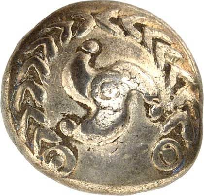 Eine Nahaufnahme einer Silbermünze mit einem Vogel darauf