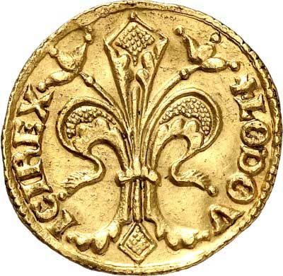 Eine Goldmünze mit einer Lilie darauf