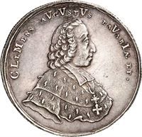 Eine Silbermünze mit dem Porträt eines Mannes darauf.