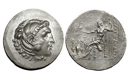 Vorder- und Rückseite einer Silbermünze mit einem Mann darauf.