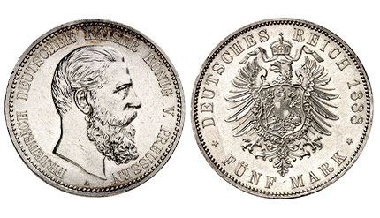 Eine Silbermünze mit einem bärtigen Mann darauf