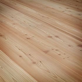Un primer plano de un piso de madera en una habitación.