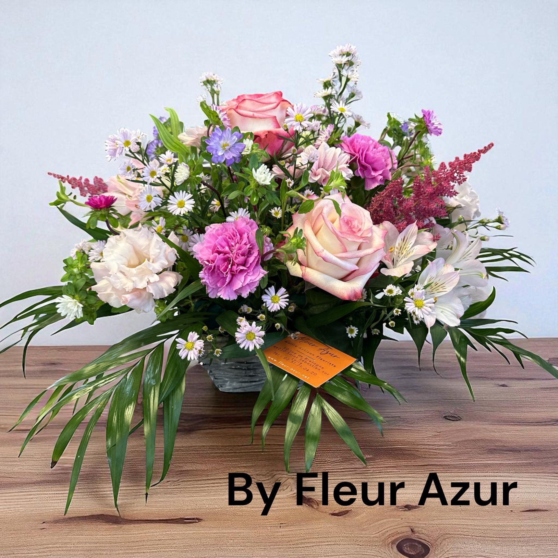 Composition de fleurs orangées