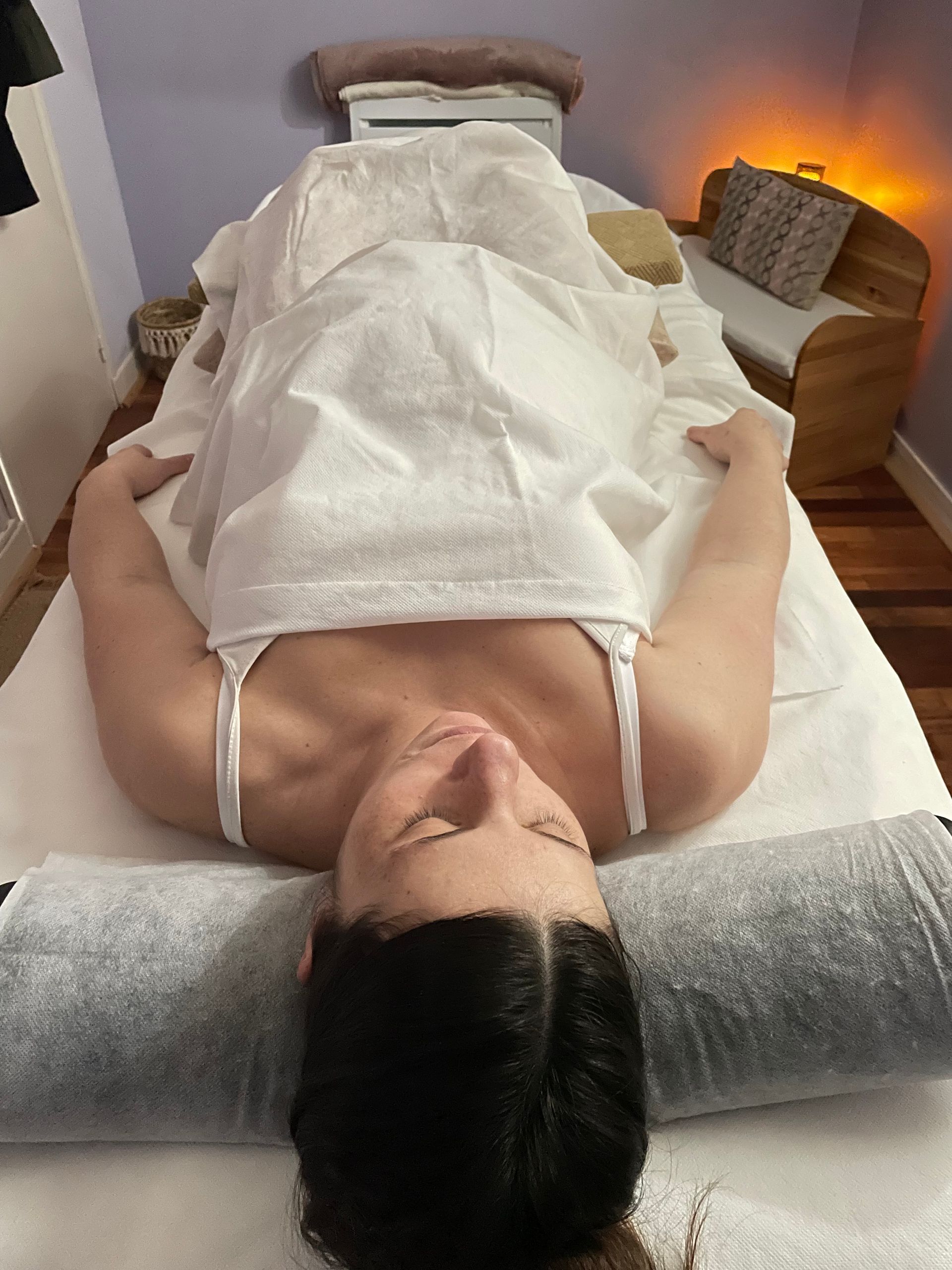 Cliente dans la salle de massage