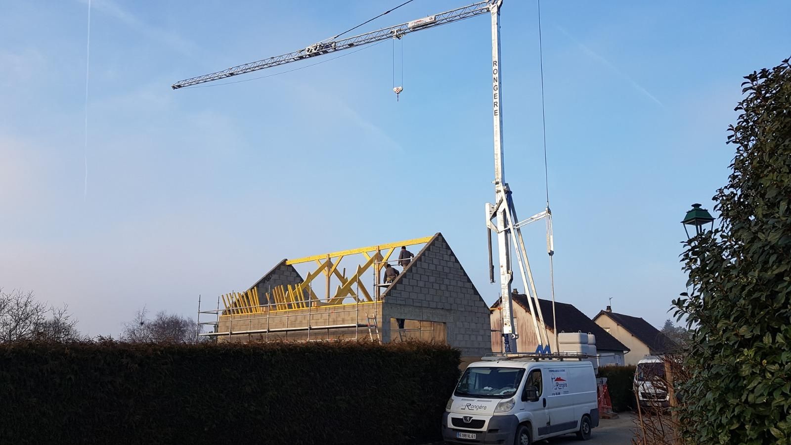 Construction de maison avec grue