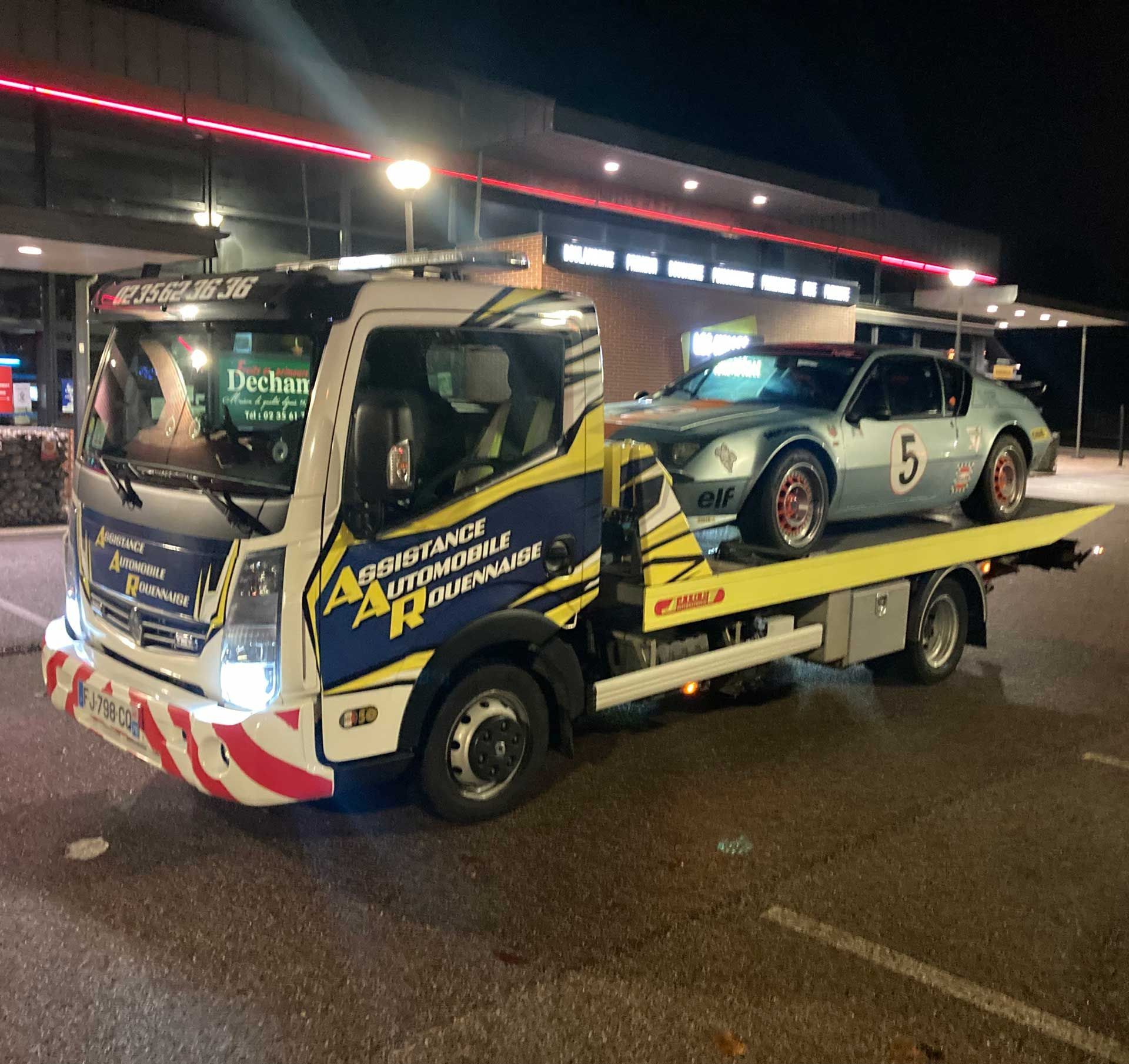 Transport d'un véhicule de course pris en charge à l'aéroport