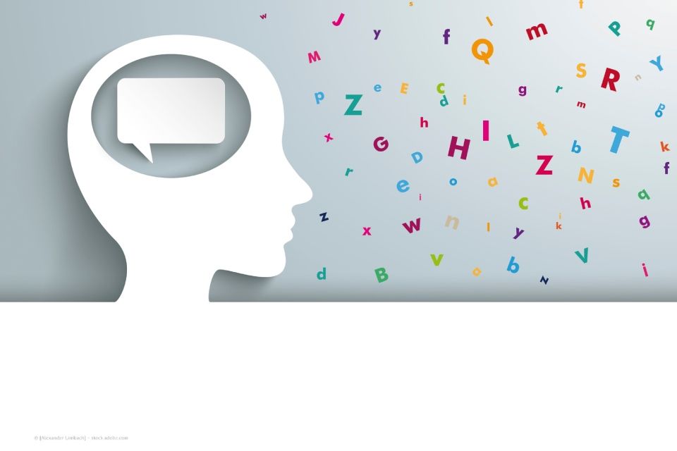 Grafik Mensch mit Sprechblase im Gehirn vor weißer Wand mit bunten Buchstaben, Logopädie im Ratzelbogen