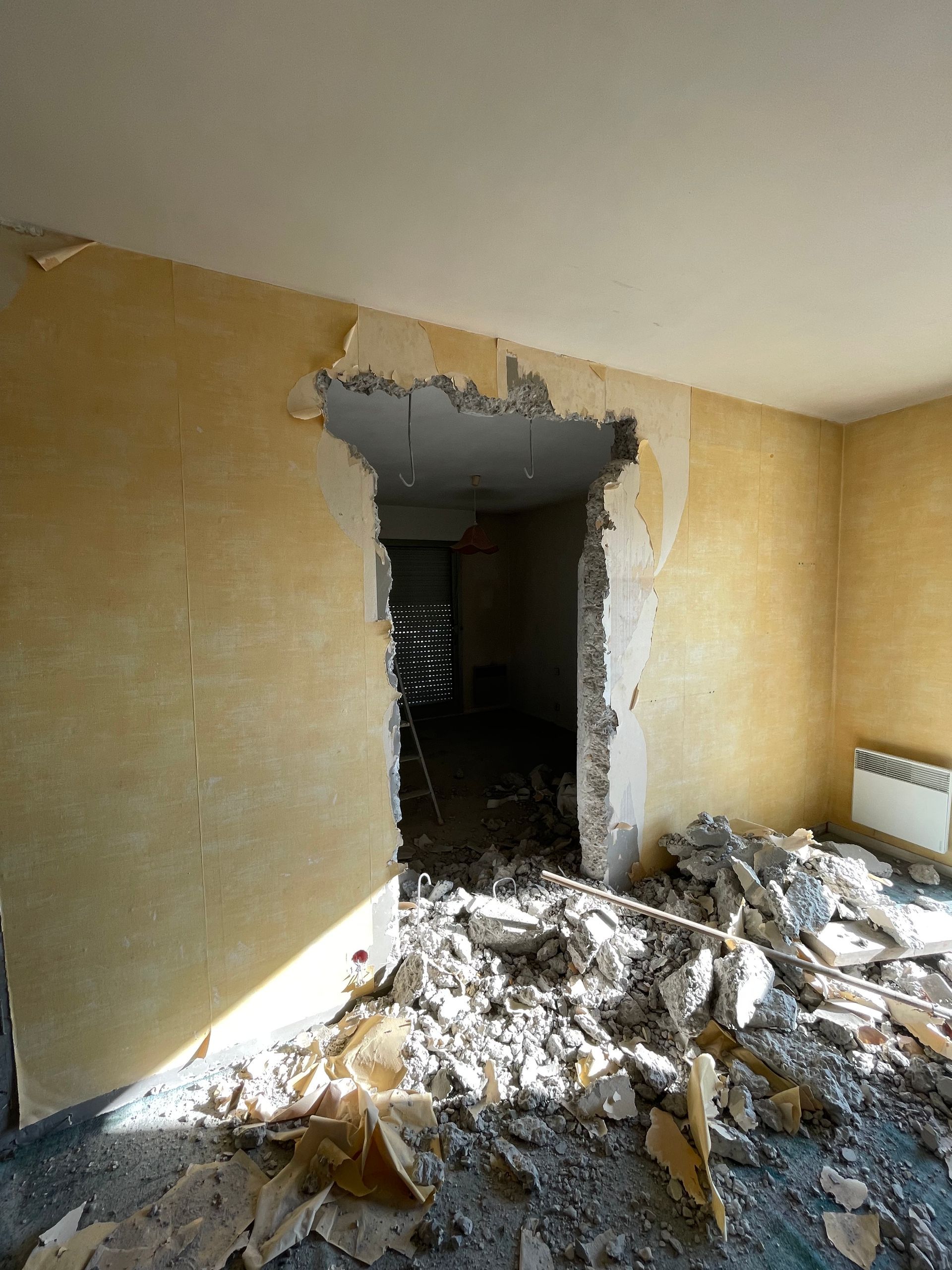 Rénovation d'un appartement : percement d'un mur banché