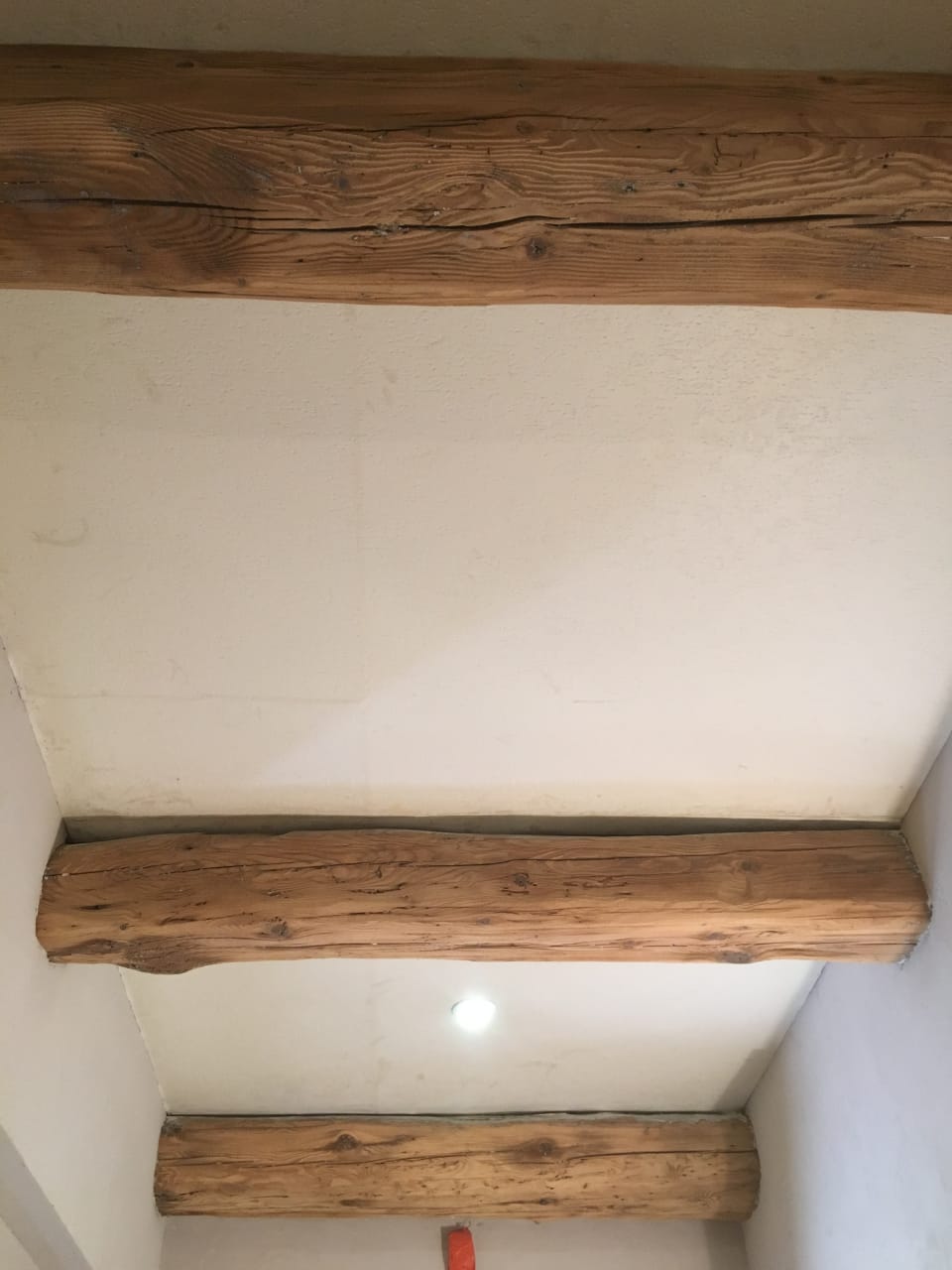 Gommage d'une poutre en bois