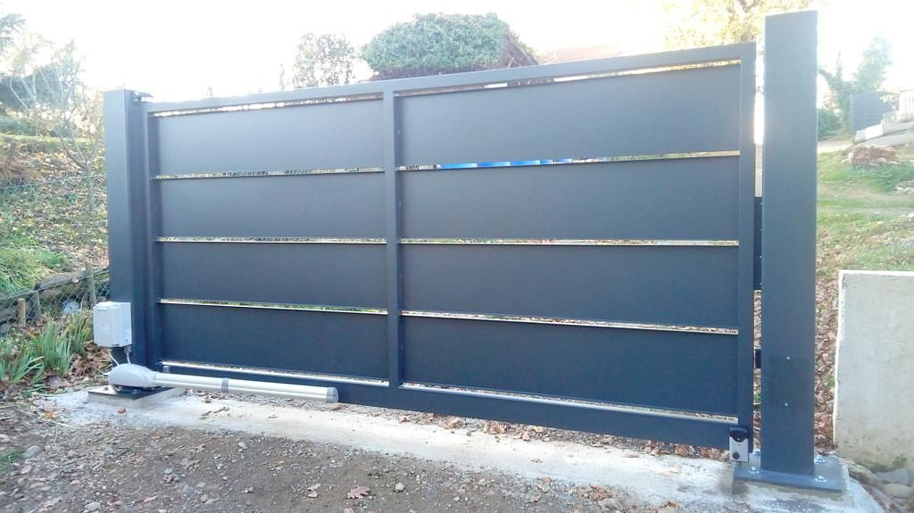 Pose de portail en acier sur mesure