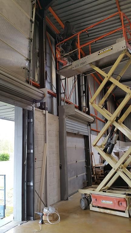 Installation d'une motorisation sur des portes sectionnelles 