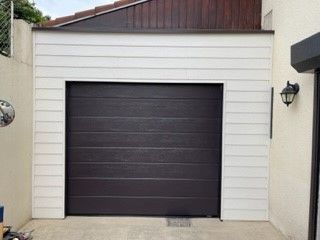 Porte Sectionnelle avec bardage PVC couleur beige