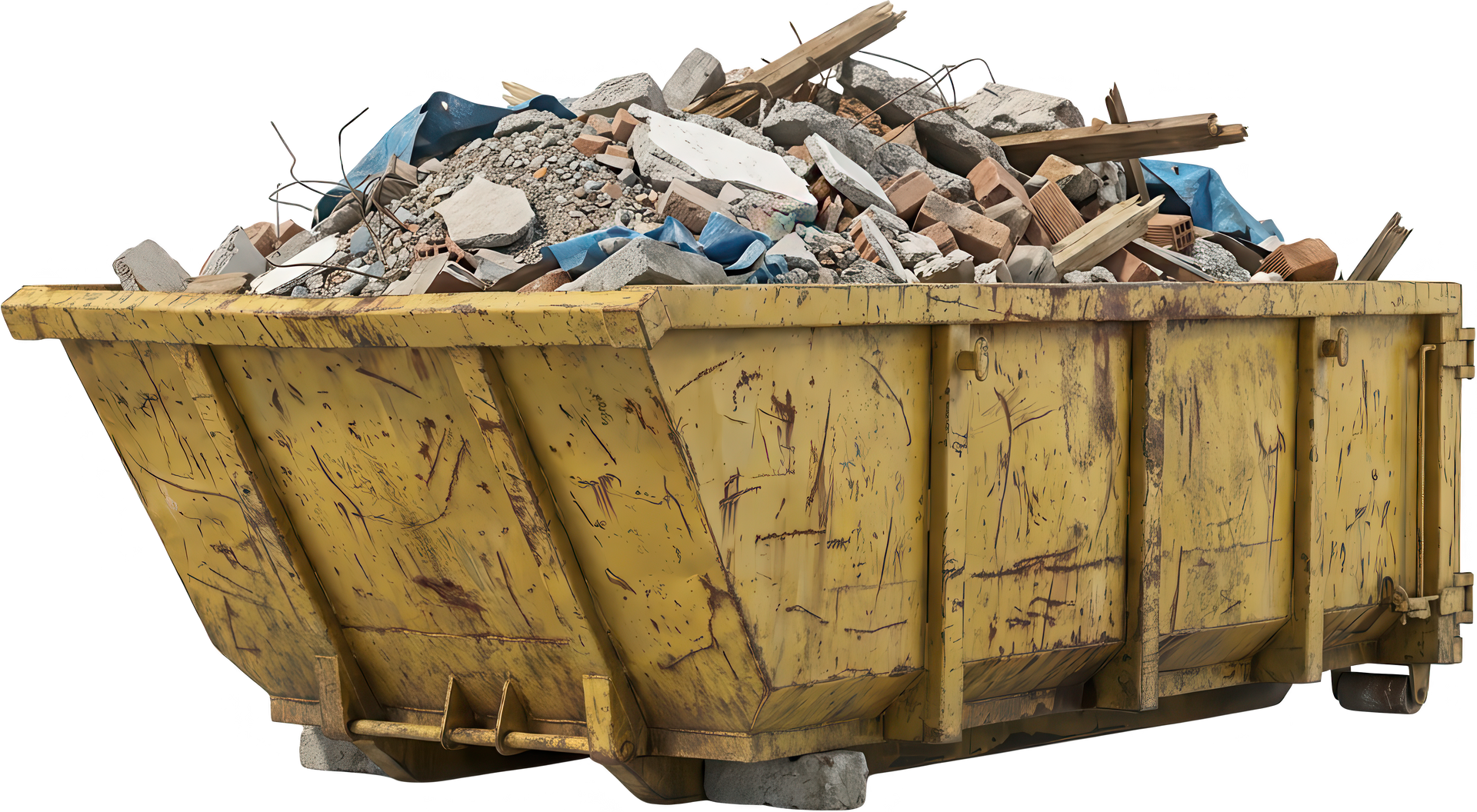 Benne jaune remplie de débris de construction, de briques et de béton.