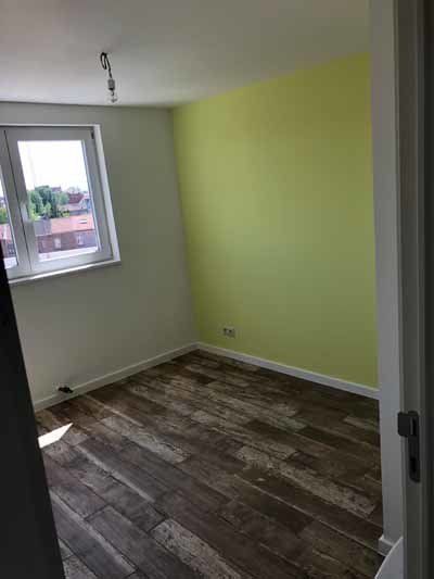 Groene muur slaapkamer