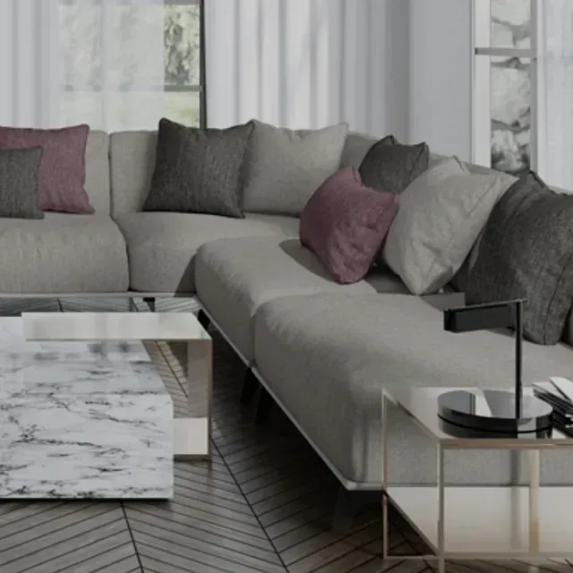 Una sala de estar con un sofá y una mesa de café.