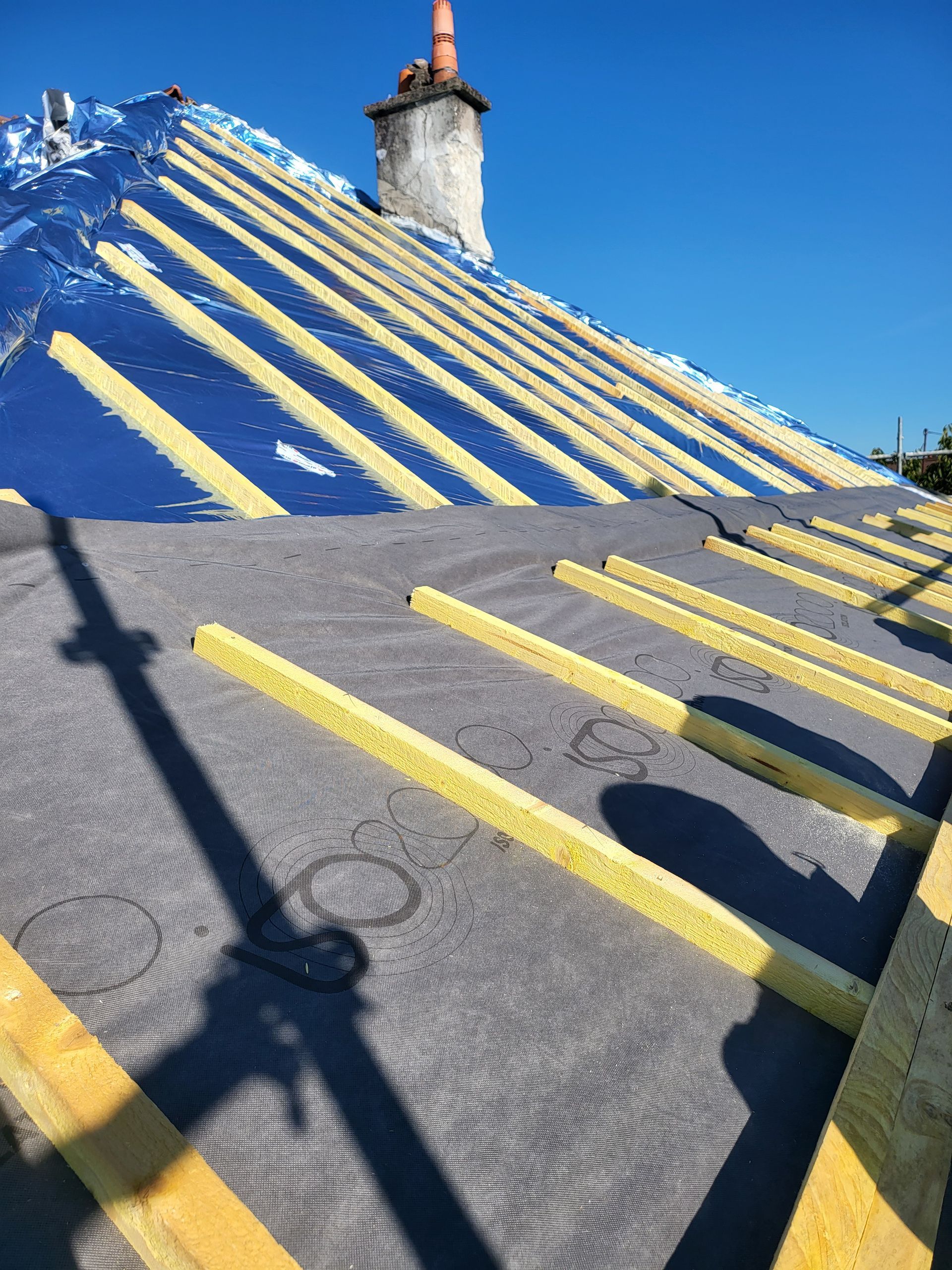 Construction d'une toiture avec bardage