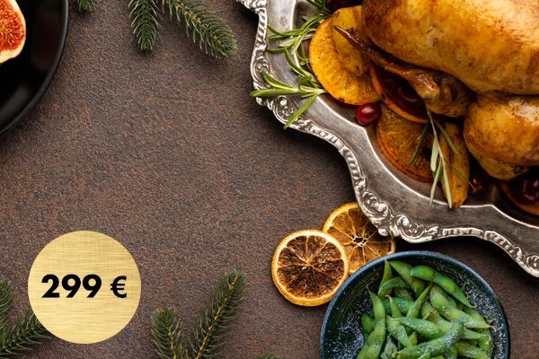 DJ legt Musik in einer Location mit Panoramablick auf den Sonnenuntergang auf. 