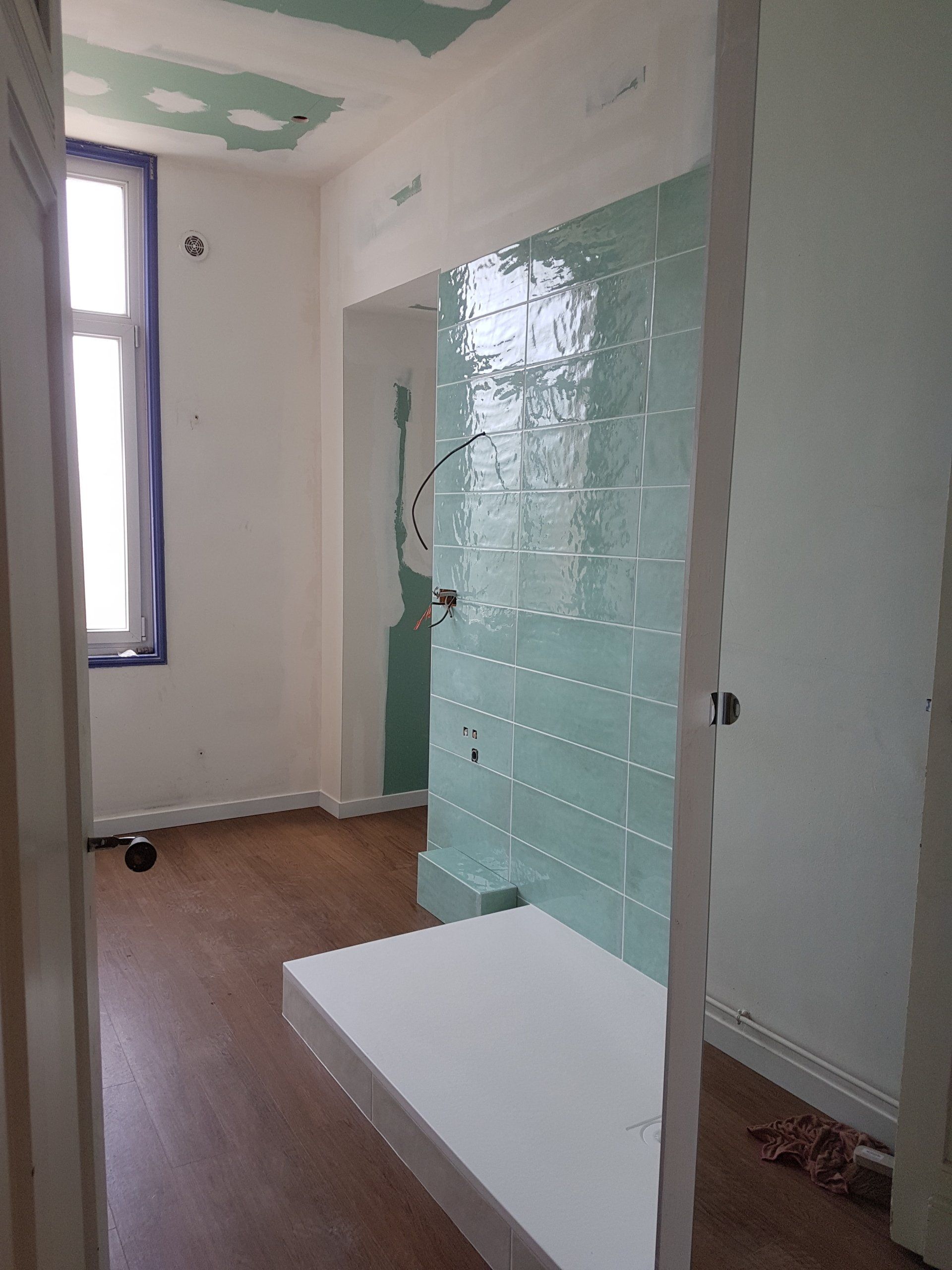 Rénovation salle de bain vert eau