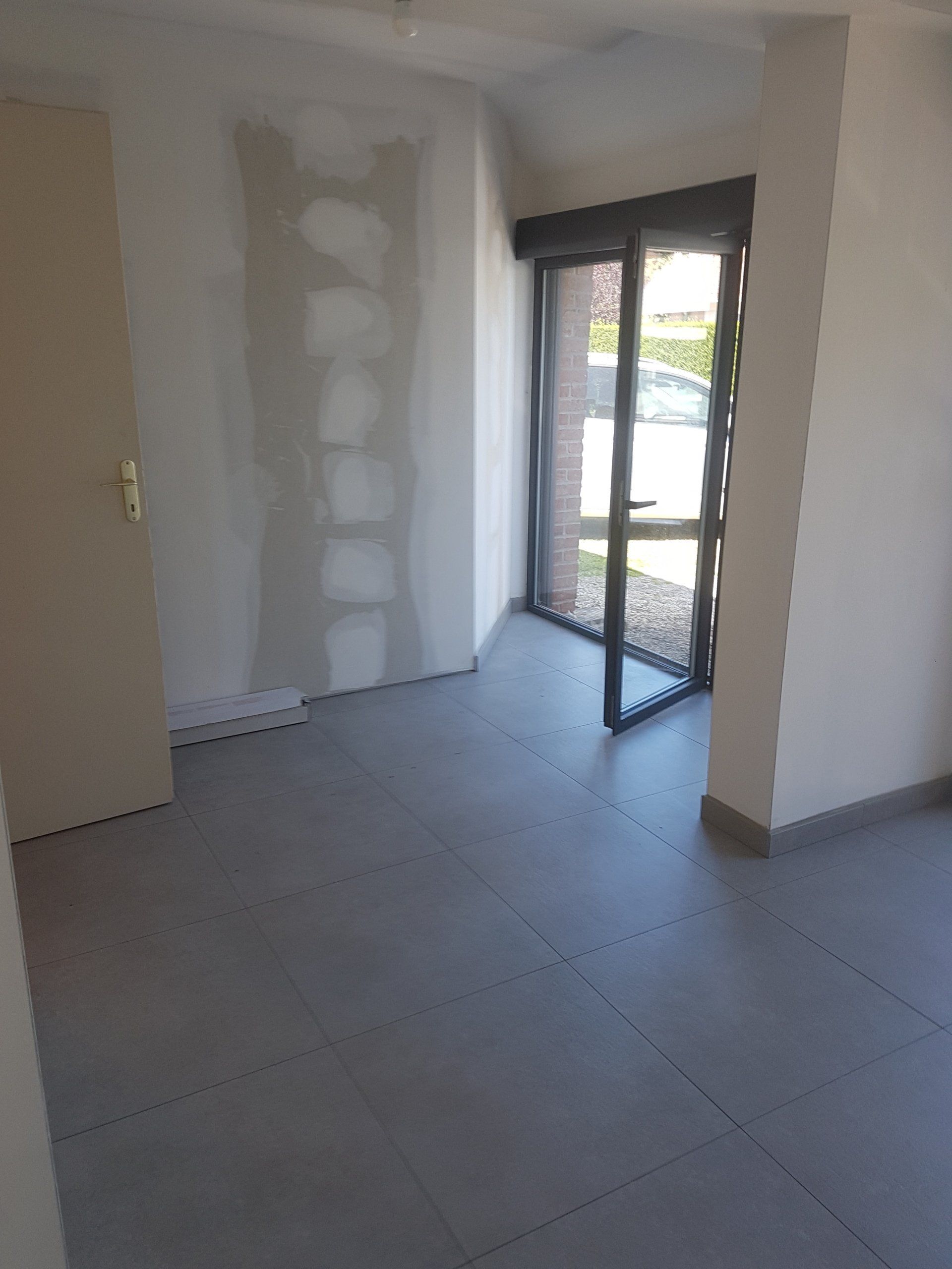 Pose de carrelage au sol