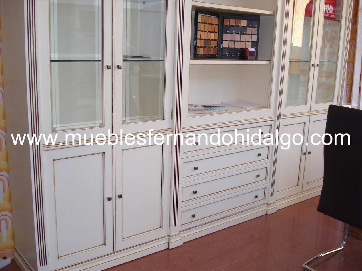 Una imagen de un mueble blanco con la página web www.mueblesfernandohida.go.com en la esquina.